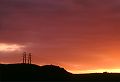 picture of sunset light California Pacific Coast mountains, power lines